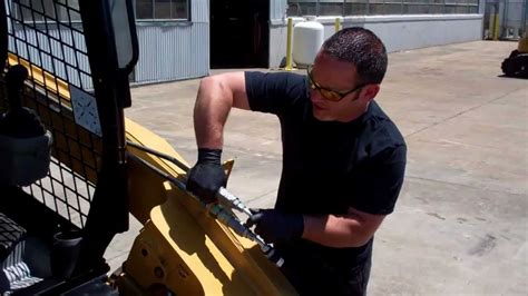 cat skid steer hydraulic release|cat 256c skid steer loader.